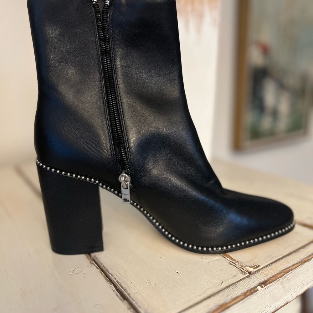 Brand new, never been worn black ankle boots.